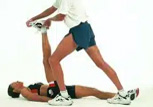 Woman getting help stretching